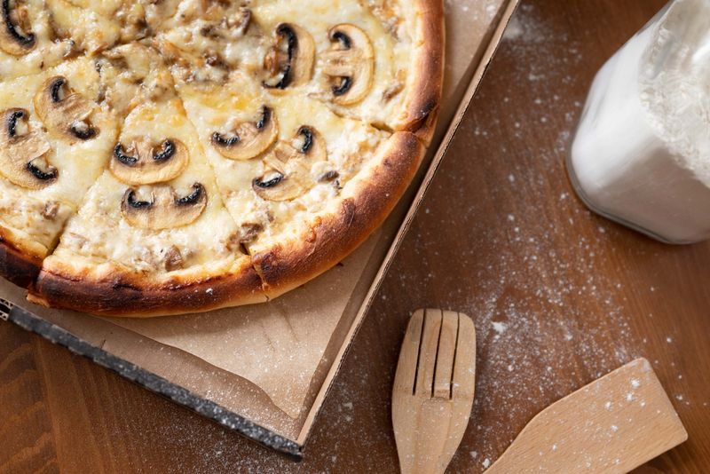 Truffle mushroom signature pizza with parmesan
