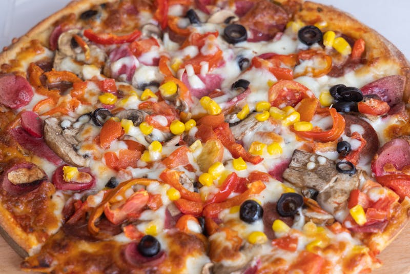 Spicy sausage and roasted pepper punch pizza